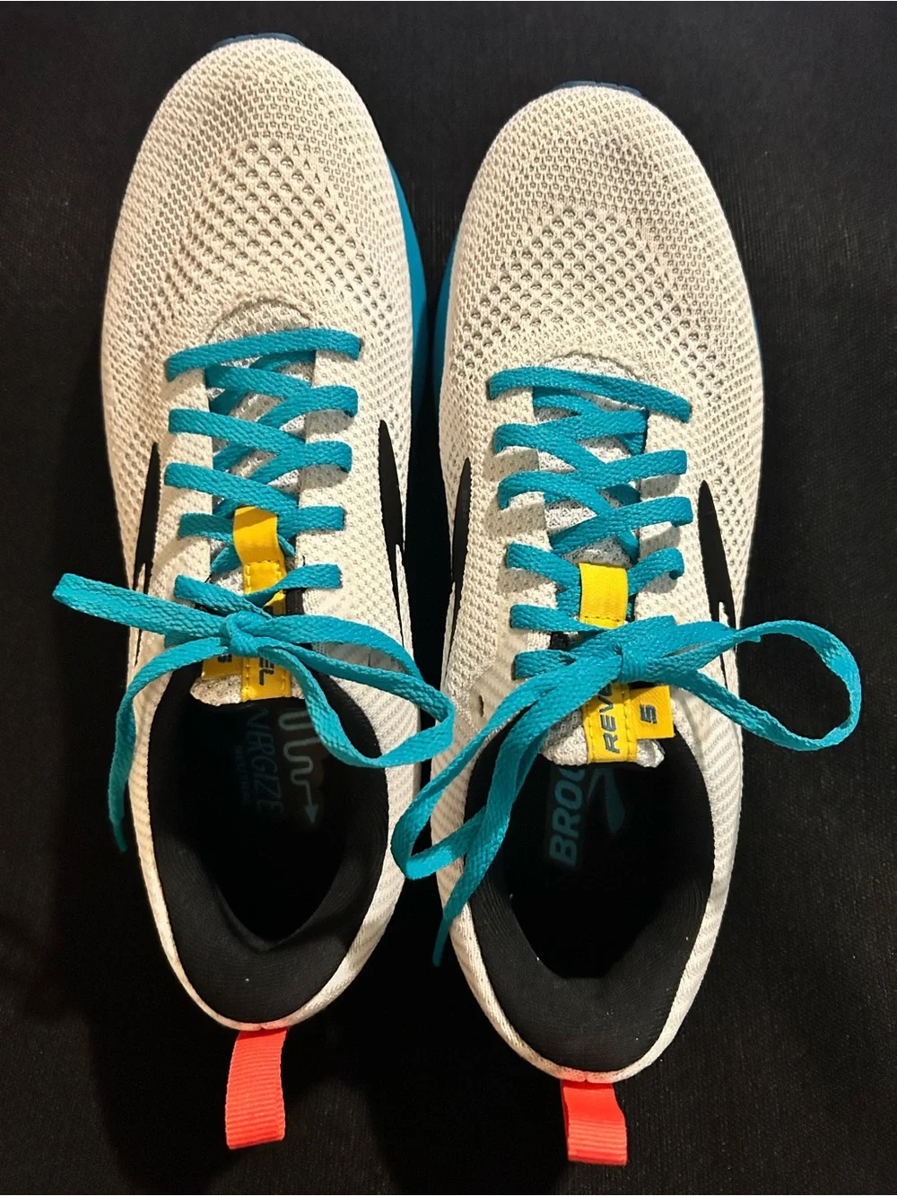 Brooks women’s White Running Shoes with Teal Laces size 9